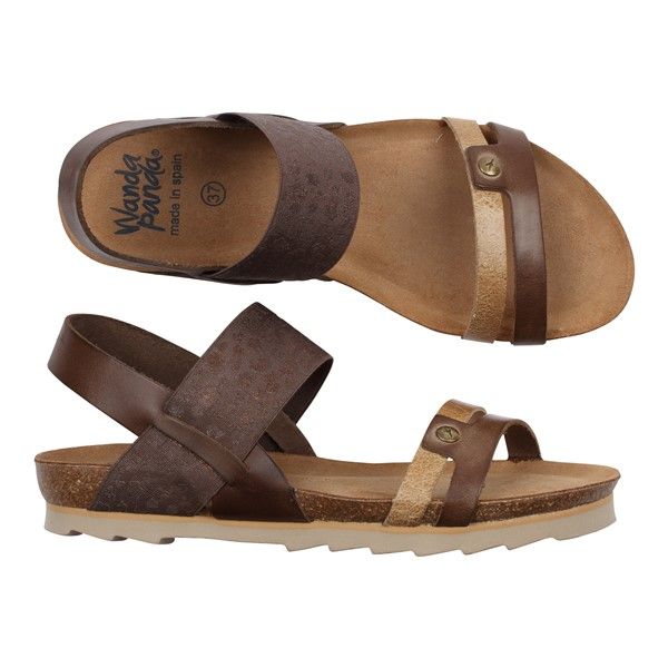Spanska sandaler från Wanda Panda. Lekfull feminin design på mjuk fotbädd av kork. Bekväm dekorativ resår över vristen.